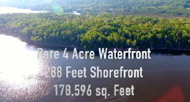 Waterfront forested lot on the Bras d'or lakes Image# 1