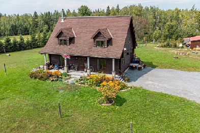 3   1 bed, 2 bath log home on nearly 3 acres of property Image# 1