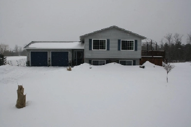 Beautiful 3 bed, 2 bath back split on a stunning 3 acre property Image# 1