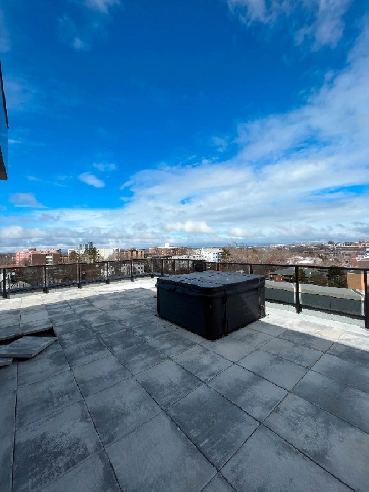 Luxurious Top Floor Penthouse 2000 sqft with Personal Hot Tub Image# 1
