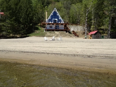 Lakefront property on Lake Simon with Private Beach Image# 1