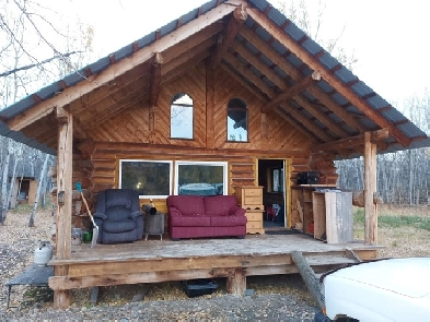 Sublease off grid log cabin 25 min from downtown Image# 1