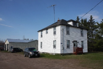 House and 100 Acres,  Large Three Bay Insulated Garage Image# 1