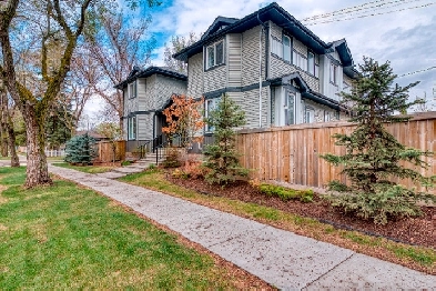 BEAUTIFUL TOWNHOME with BASEMENT SUITE and GARAGE parking stall! Image# 1