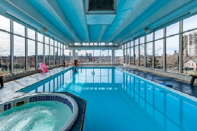 Stunning Downtown Condo w/ Salt water pool! Close to everything Image# 1