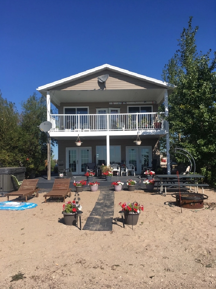 Lakefront House / Cabin in Resort Village of Leslie Beach in Saskatoon,SK Houses for Sale