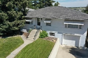 Two Bedroom, One Bath House for Rent (Off Centre Street) Image# 1