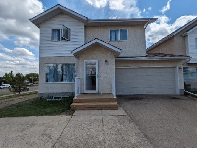 2 Storey Bareland condo with DOUBLE ATTACHED GARAGE Image# 5