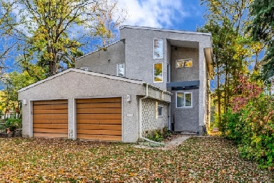 STUNNING 3 BDR BACKING THE RIVER IN ST.VITAL! - 57 Egerton Rd. Image# 1