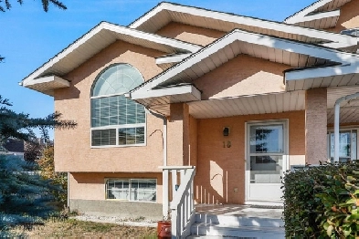 Renovated 4 BED End Unit w/ Spacious Layout & Ample Parking Image# 1
