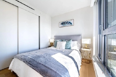 Modern Bedroom with City View - Downtown, Utilities & Amenities Image# 3