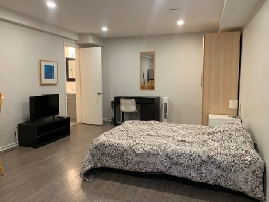 Furnished bach. suite. Minutes from Skytrain & Transit All Incl. Image# 1