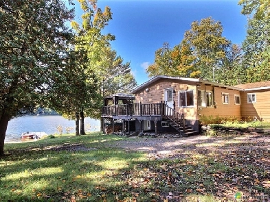 Chalet bord de l'eau à louer près de Tremblant-Laurentides Image# 1