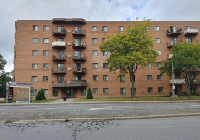 3 bedroom 1 bath with parking in a condo building Image# 1