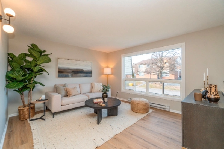 Spacious, Bright and updated Condon townhome in Craig Henry in Ottawa,ON - Condos for Sale