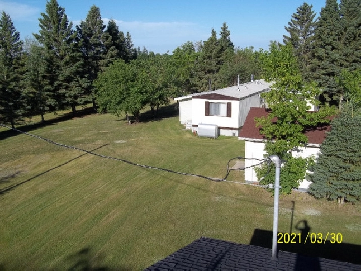 ACREAGE AND HOME WITH LARGE SHOP in Saskatoon,SK Land for Sale