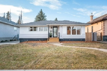 ONE OF A KIND! Bungalow with Legal Suite! PRICE IMPROVEMENT!