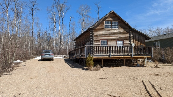 Exceptional 3-Season Log Cabin with Stunning Lake View in Regina,SK - Houses for Sale