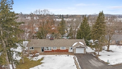 3 Bed, 3 Bath Bungalow on Expansive Lot with Walkout Basement Image# 1