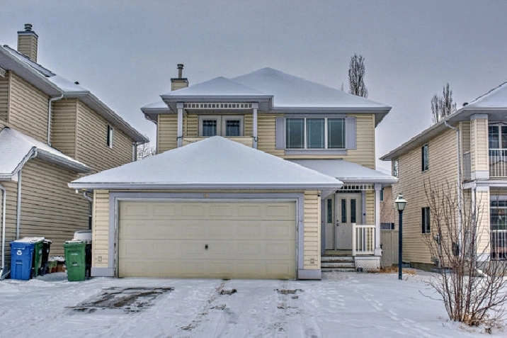 Detached two storey house for sale in a lake community in Calgary,AB - Houses for Sale