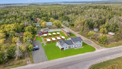 Dual-Purpose Property Minutes from Grand Beach! Image# 10