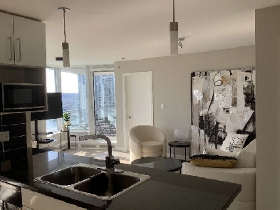 Gorgeous Fully Furnished 2 Bedroom and Den Condo in Vancouver Image# 1