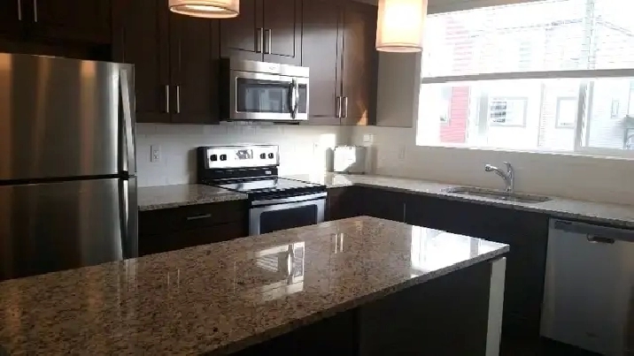 Looking for A Roommate: Spacious Townhouse in South Calgary in Calgary,AB - Room Rentals & Roommates
