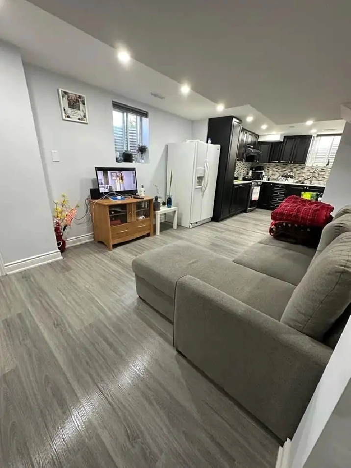 Fully Furnished 2 Bedroom Den Legal Walkup Basement available in