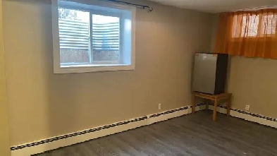 - Utilities include -A large basement  room for rent Image# 7