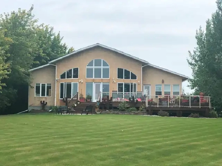 CUSTOM BUILT WATERFRONT HOME ON THE LEE RIVER LAC DU BONNET! in Winnipeg,MB - Houses for Sale