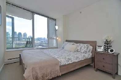 Spacious Comfort with Our Downtown Double-Sized Bedroom! Image# 1