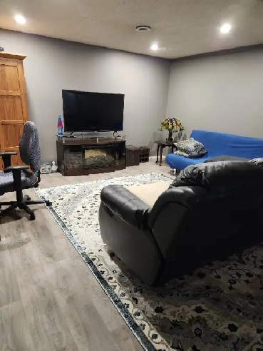 Furnished basement suite for rent. Image# 1