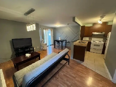 Condo semi-meublé à louer-Quartier Dix30 1475/mois Image# 1