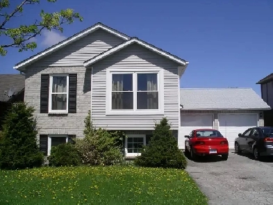 RARE FIND - 2 bed basement in raised bungalow w/GARAGE Image# 1