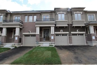Welcome to this 2-story new build townhome in West Brant! Image# 1