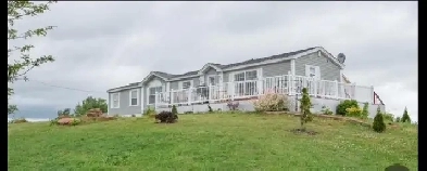 Acreage home  overlooking the beautiful town of Hunter River PEI