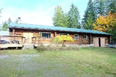Log home for sale in Merville - 5 acres Image# 1