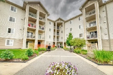 TWO BEDROOM CONDO WITH TITLED UNDERGROUND PARKING Image# 1