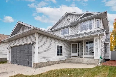 FRESHLY UPDATED 4 BED RIVERBEND SE CALGARY HOME FOR SALE Image# 1