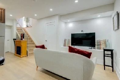 Stylish new 2-bedroom bright basement apartment Image# 1