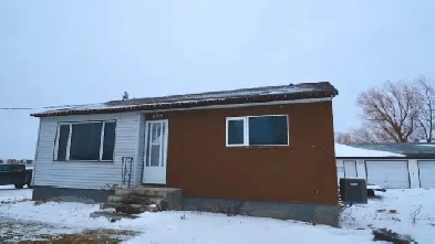 House with Huge Heated Garage (14'x11' Door) on McGillivray Blvd Image# 1