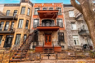 Magnifique condo de 4 chambres au cœur du Plateau Image# 1