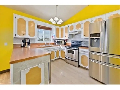 Two Bedroom Bi-level house ( upper floor) for rent in NE,Calgary Image# 1