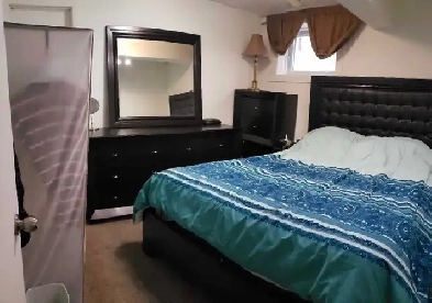 unfurnished room in a suite basement Image# 1