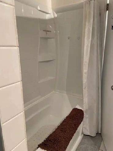 Furnished Upstairs Bedroom with Queen Bed – Calgary, AB Image# 1