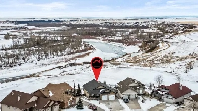 FULLY DEVELOPED WALKOUT BUNGALOW BEAUTIFUL BOW RIVER VIEWS Image# 1