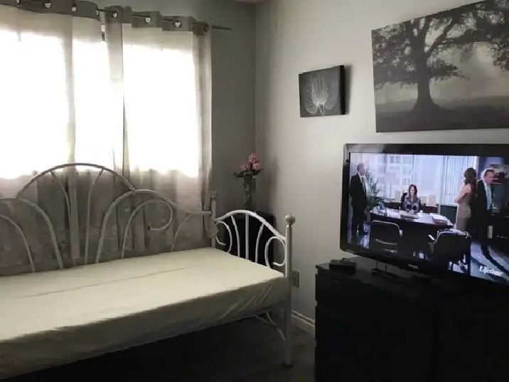 A Nice Furnished Room in NE Calgary for rent to female. in Calgary,AB - Room Rentals & Roommates