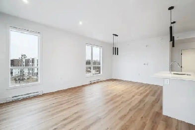 Top Floor 2 Bedroom   1.5 bath corner unit with indoor parking Image# 1