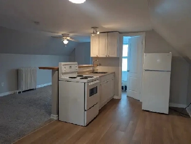 Attention – Students – Furnished bachelor apt on Top floor Image# 1