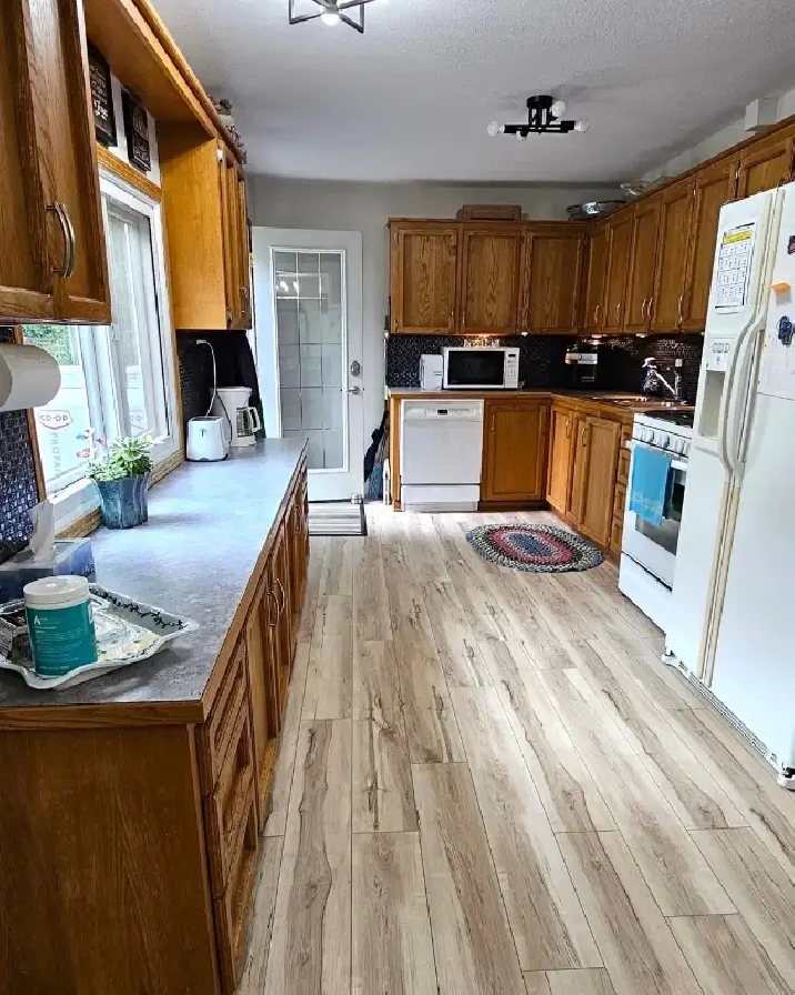 Beautiful Buena Vista Bungalow just a few steps from the Beach! in Regina,SK - Houses for Sale